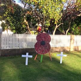 Poppy and crosses front lawn tribute, Pinehaven, Anzac Day 2020