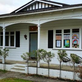Teddy bears and children's artwork window display, Heretaunga