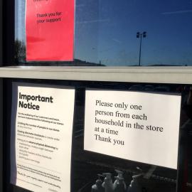Covid-19 signs at entrance to Countdown supermarket on Queen Street 