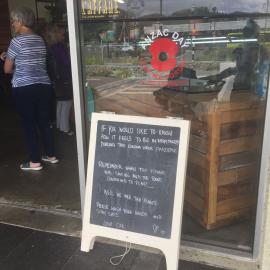 Cake and Kitchen cafe chalkboard coronavirus message