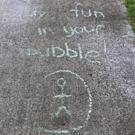 "Have fun in your bubble" pavement message