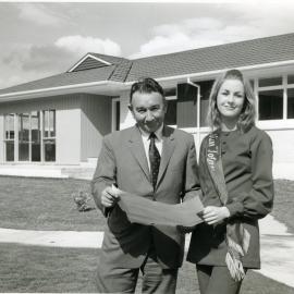 Totara Park; show house; Noel Dalley (project manager) and 'Miss Totara  Park'. [P2-1877-3481]