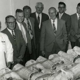 A & P show 1961; joints of meat with third prize banner and panel of judges.