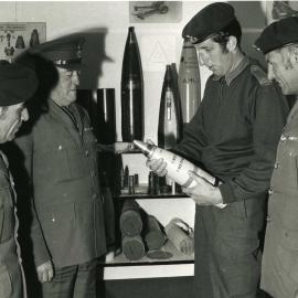 Trentham Camp (?); soldiers and artillery projectiles.