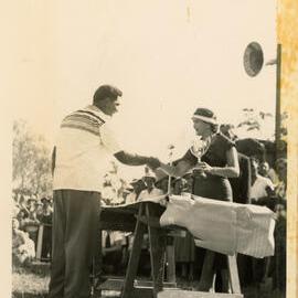 Axemen's Association Scrapbook; Axeman accepting award; 1958 