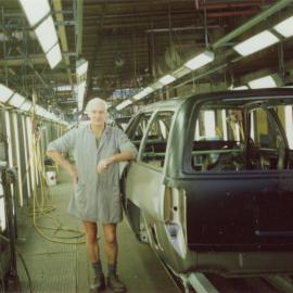 General Motors; Harry Ross on Assembly Line; ca. 1990