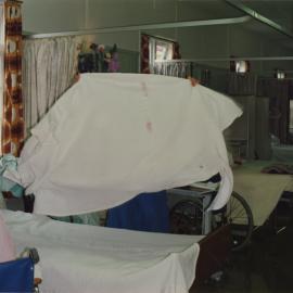 Silverstream Hospital; Nurse Making a Bed; ca. 1989