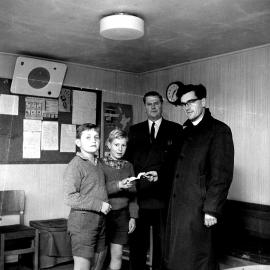 Brentwood School boys John Gwilliam, Kevin Odlum; cheque for Corso.