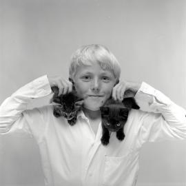 Alan Blanche with kittens, 1969
