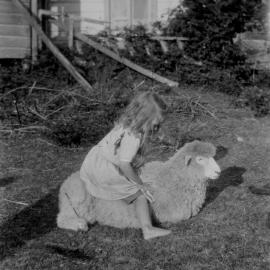 Flora Danahay on Pet Sheep at Front of 'McCurdy's Castle'; ca. 1928