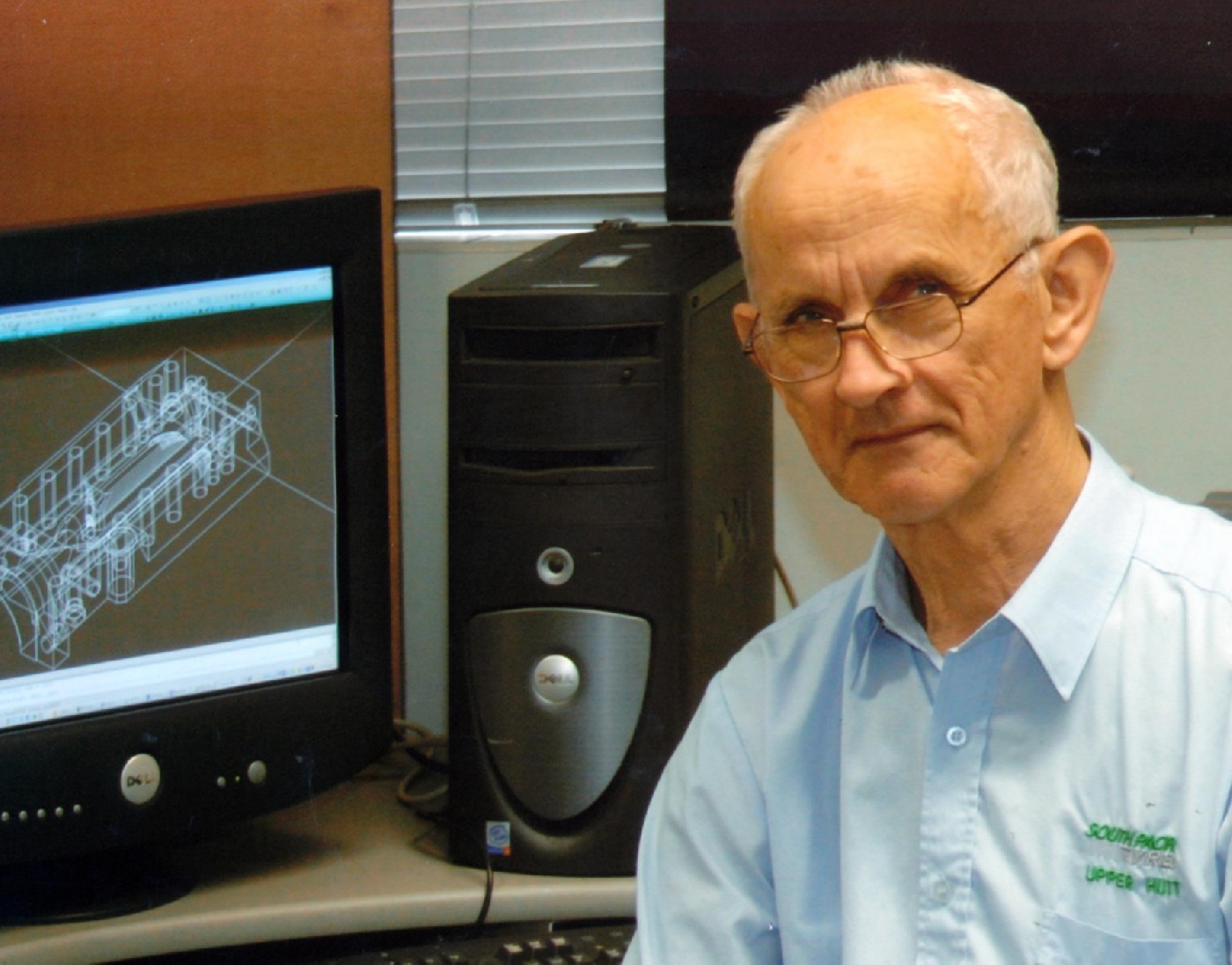 2006; tyre factory. Image on the screen is half of an extruder head.